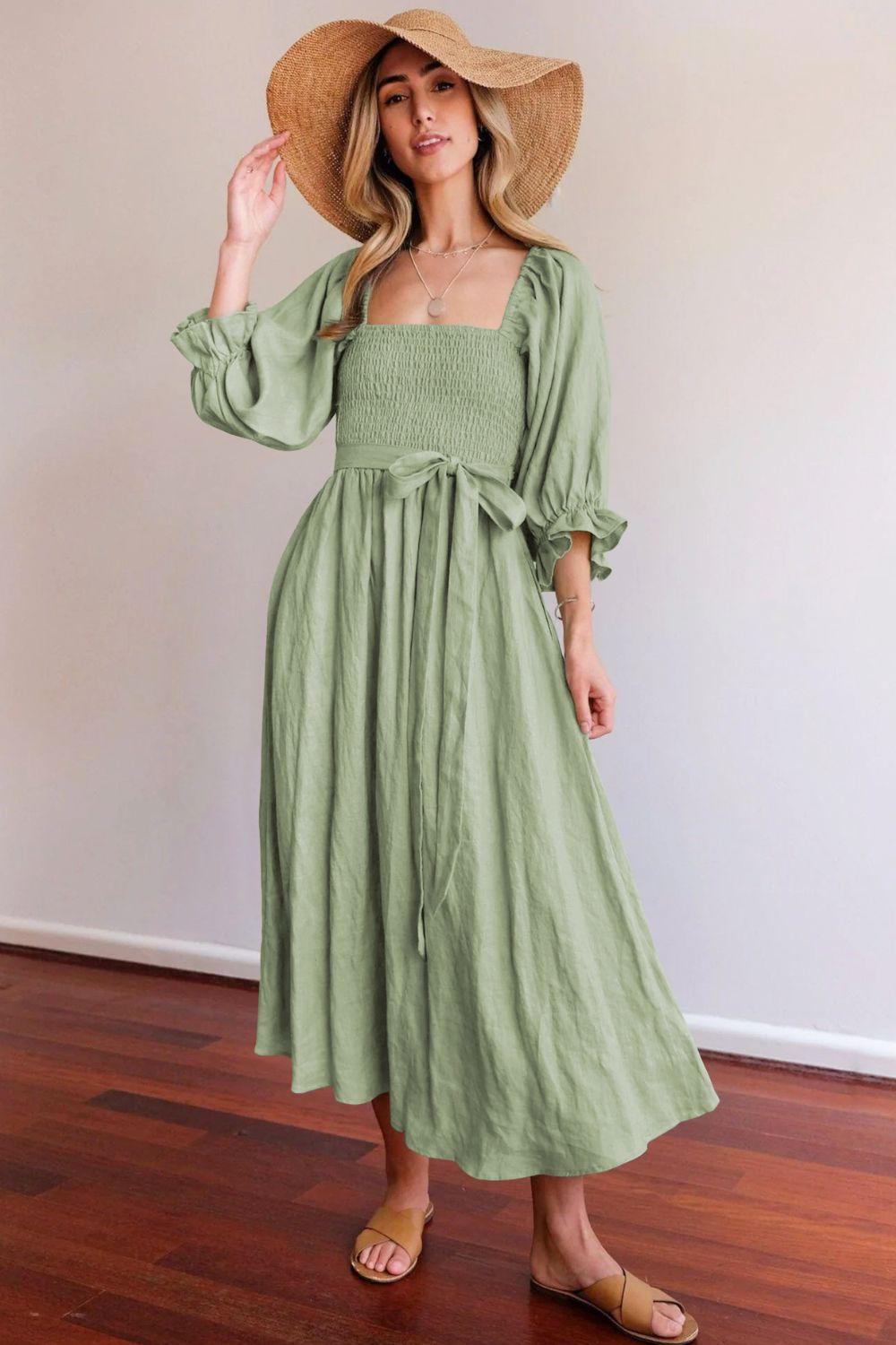 Women elegant, tailored maxi dress with puff sleeves and tie belt Ivyshape