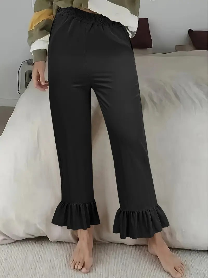 Ladies flared trousers with playful ruffle details Ivyshape