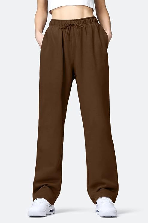 Women's comfortable sports pants with elastic waistband and practical pockets Ivyshape