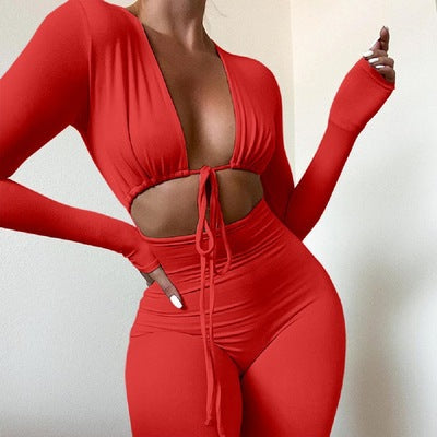 Women's fitted jumpsuit with deep V-neck and elegant long sleeves Ivyshape