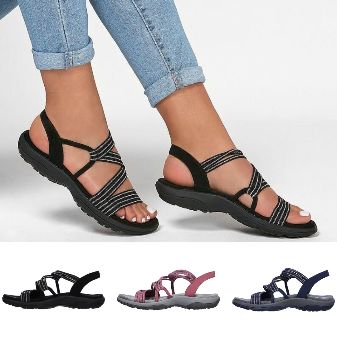 Orthopädische Sandalen mit gekreuzten Riemen und stützender Sohle, abgebildet in Schwarz, Blau und Pink