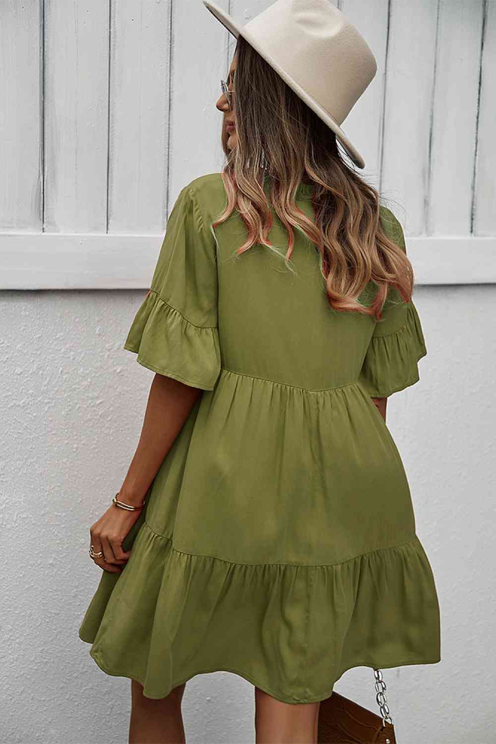 Buttoned Tie Neck Tiered Mini Dress