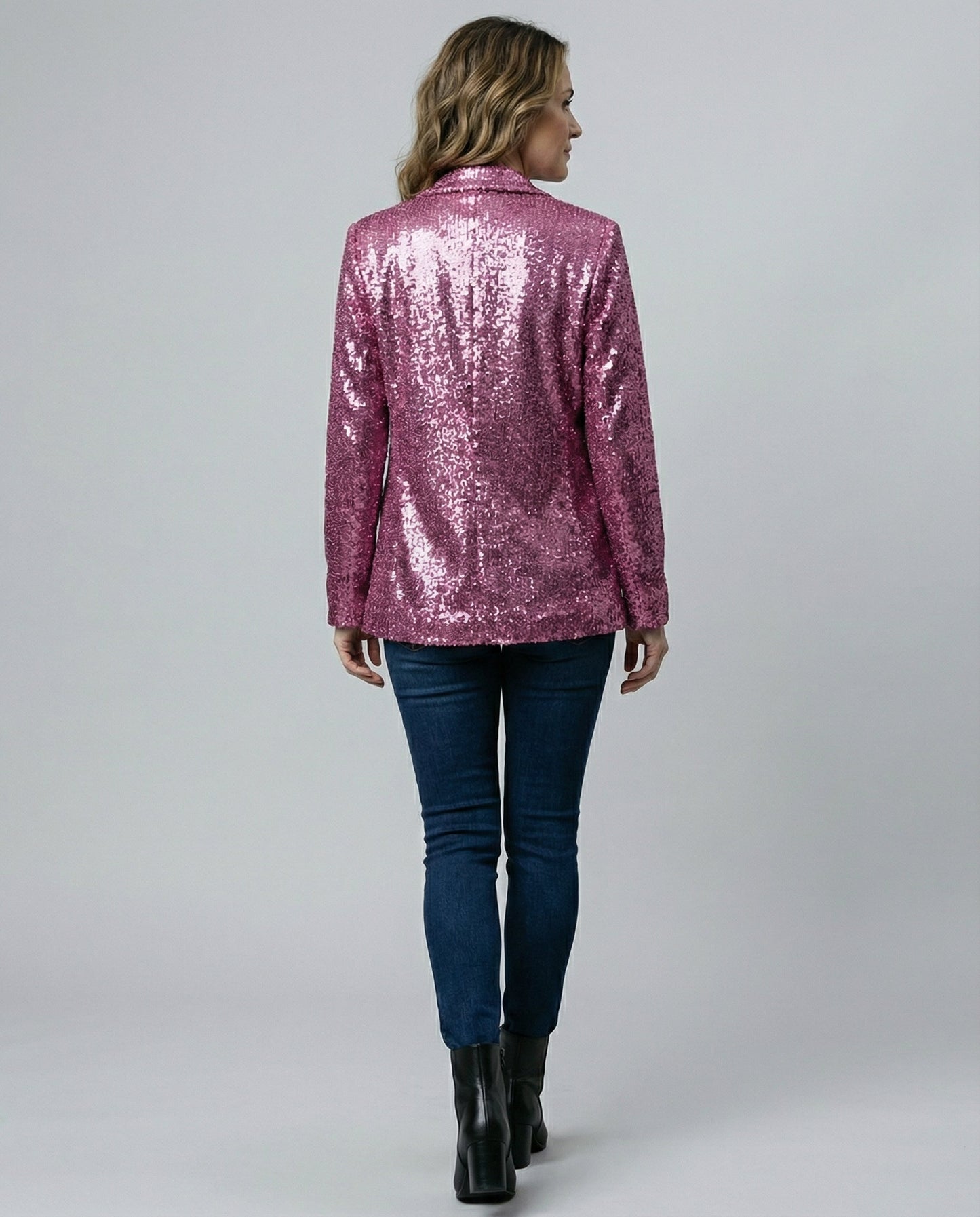 sequin blazer with padded shoulders, open front design, and fully lined construction.