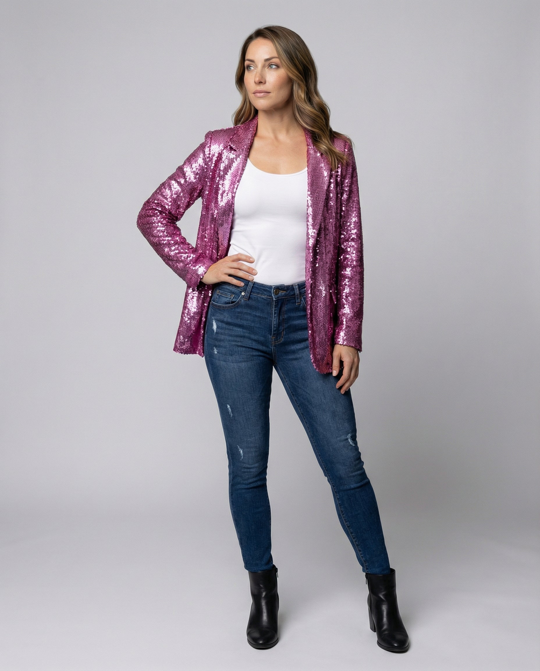 sequin blazer with padded shoulders, open front design, and fully lined construction.