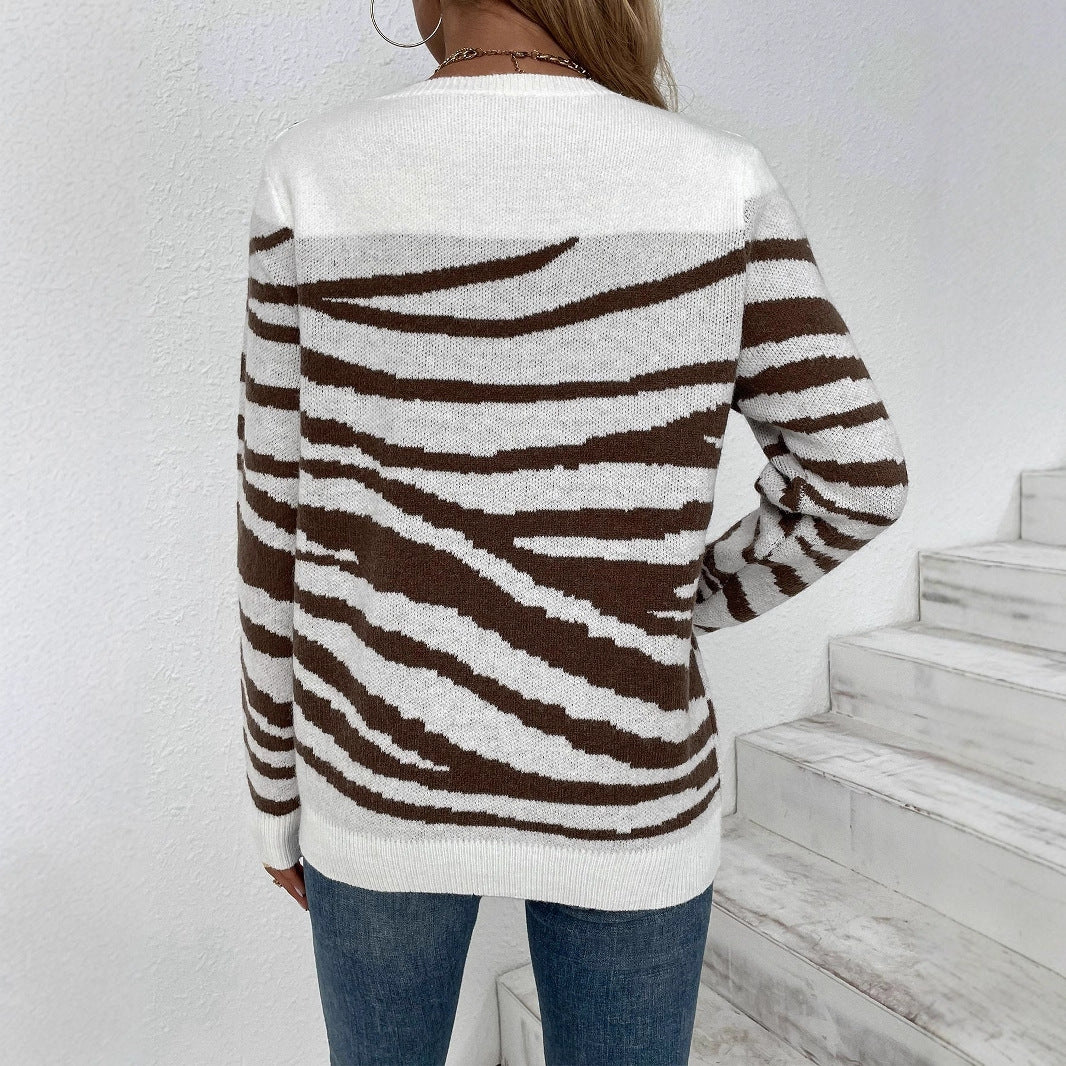 Women’s cozy knitted sweater with modern zebra stripe pattern and comfortable fit Ivyshape