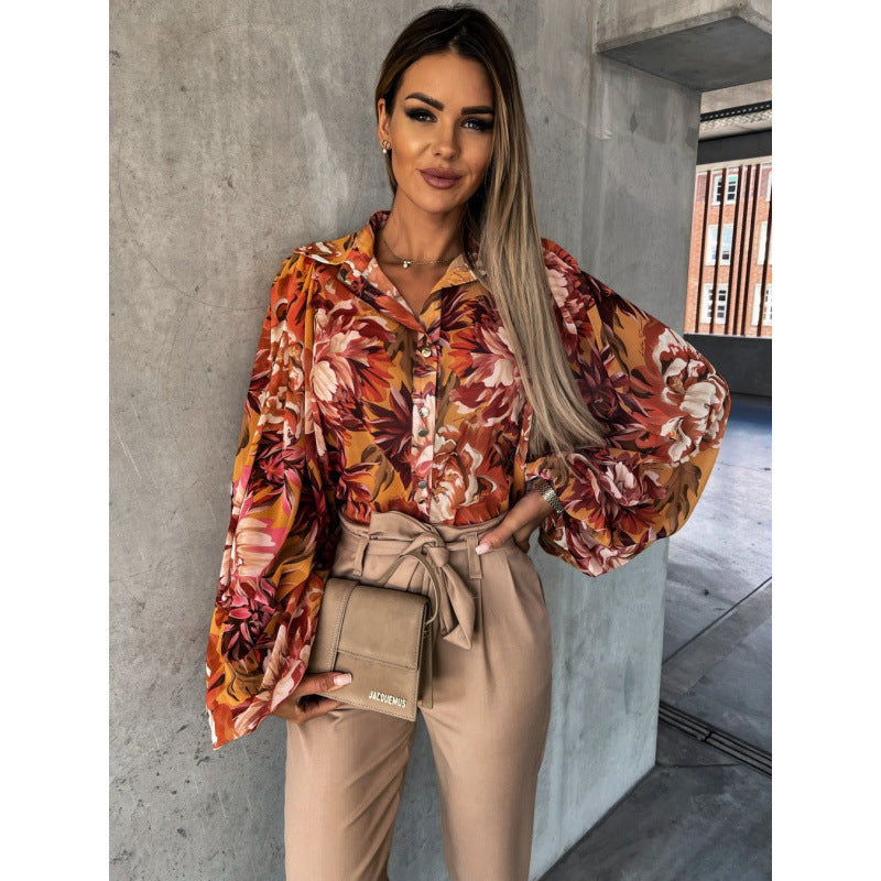 Women’s blouse with floral print and bell sleeves Ivyshape