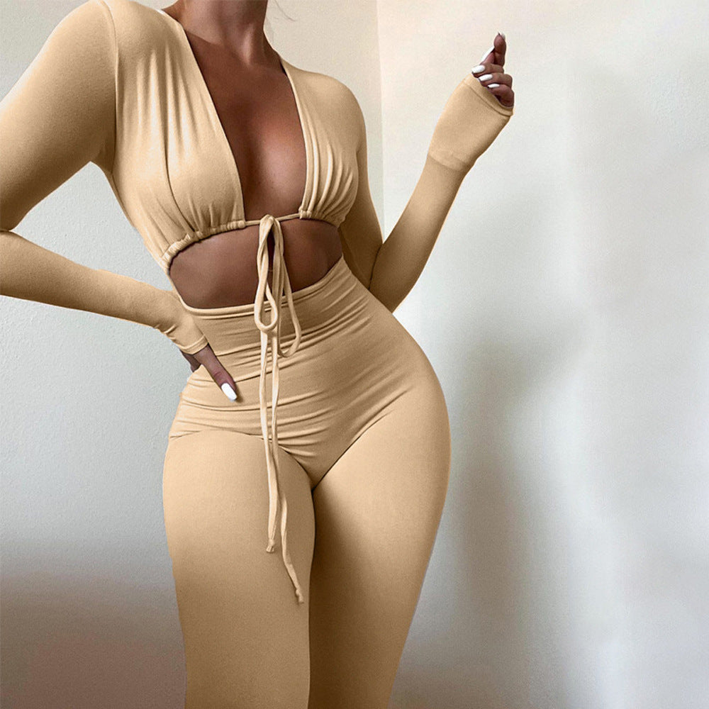 Women's fitted jumpsuit with deep V-neck and elegant long sleeves Ivyshape