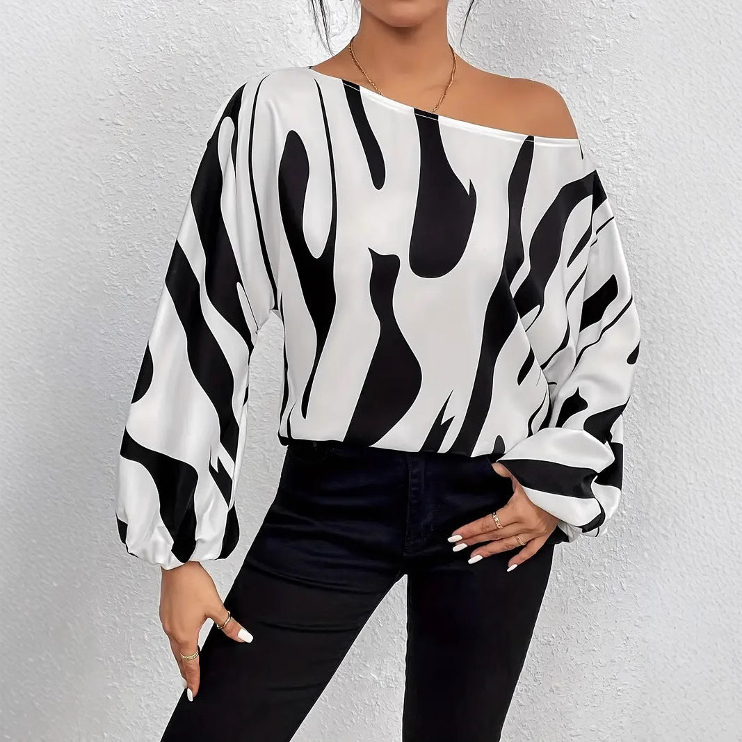 Women's satin blouse with asymmetrical cut and eye-catching print Ivyshape