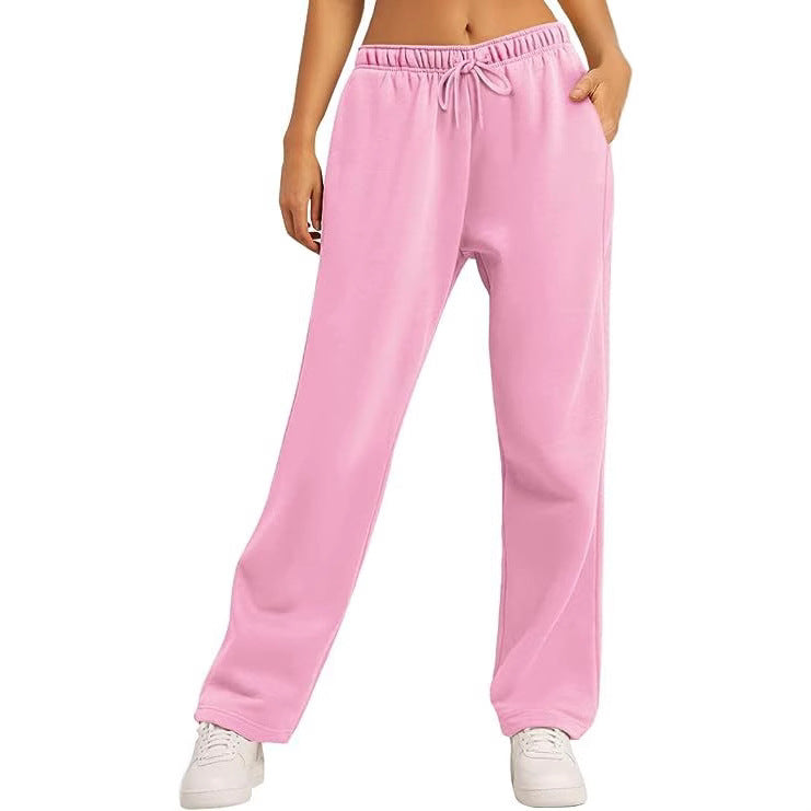 Women's comfortable sports pants with elastic waistband and practical pockets Ivyshape