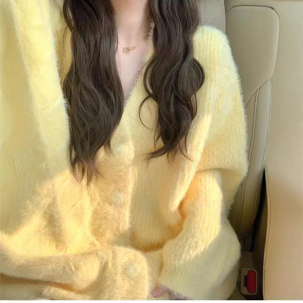 Women's oversized cardigan with soft fleece and special button details Ivyshape