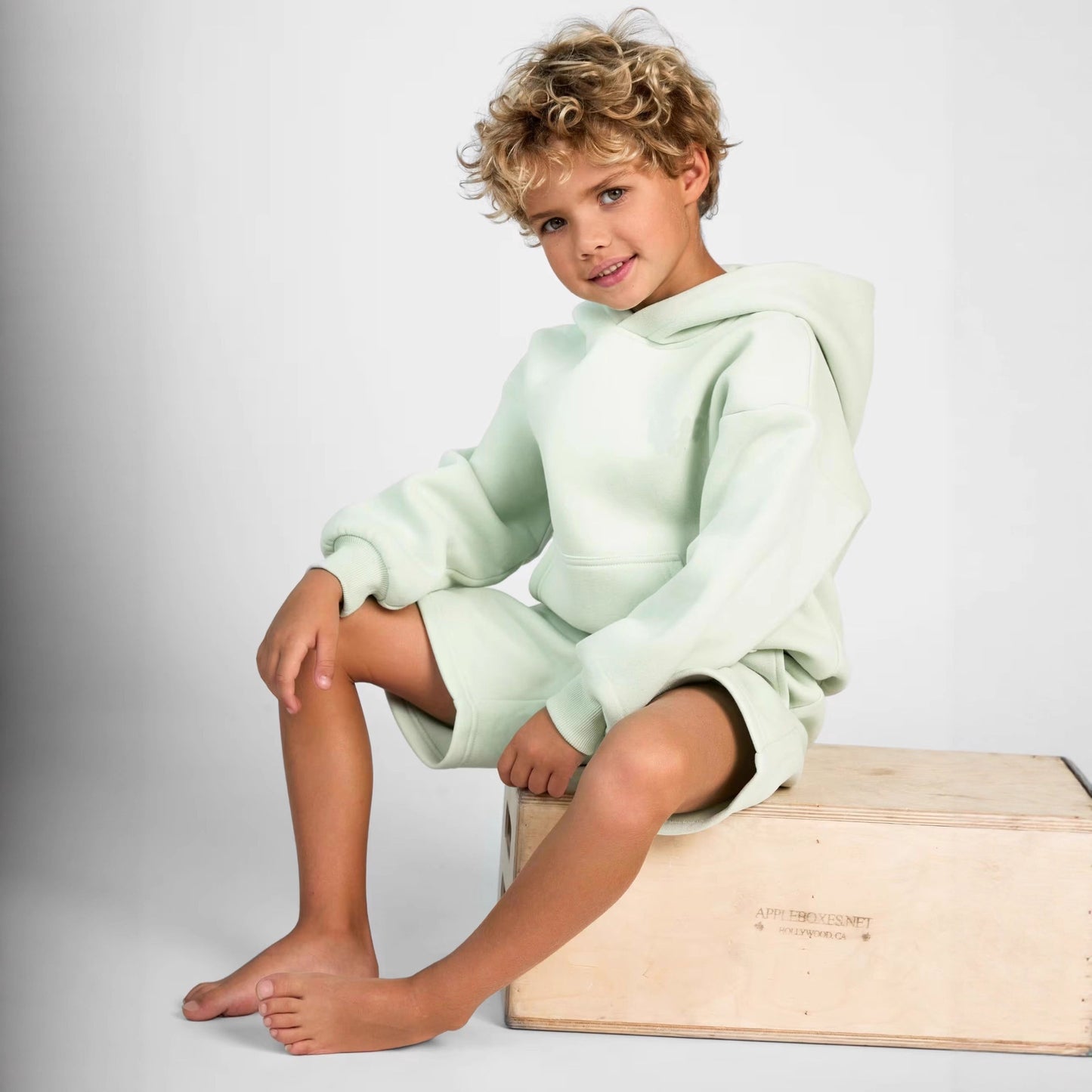 Women's hoodie sweatshirt and shorts set made of soft fleece with practical pockets Ivyshape