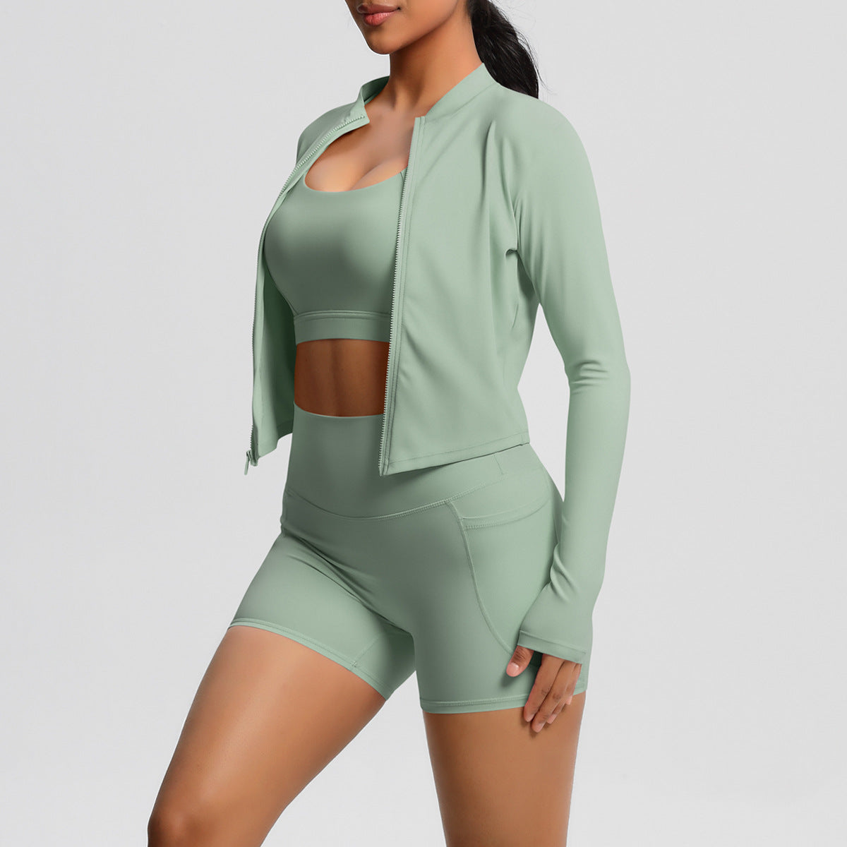 Women's sporty training set with fitted top and high-waisted shorts Ivyshape