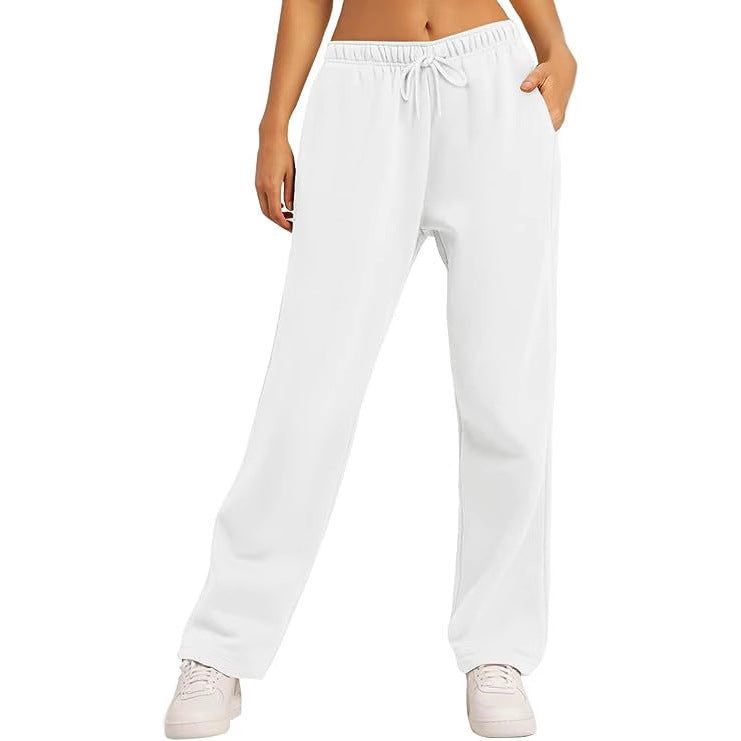 Women's comfortable sports pants with elastic waistband and practical pockets Ivyshape