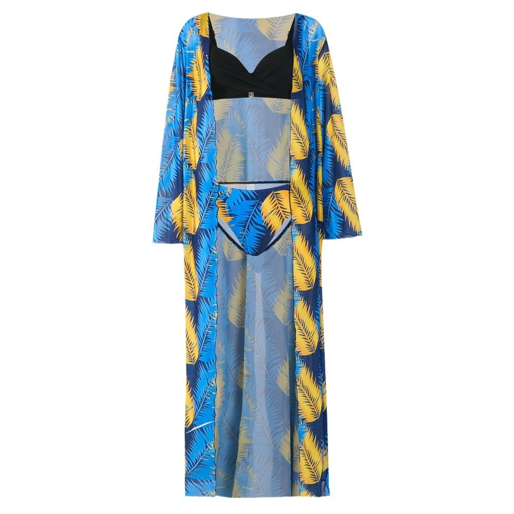 Women’s beach dress with contrasting bikini set and tropical pattern Ivyshape