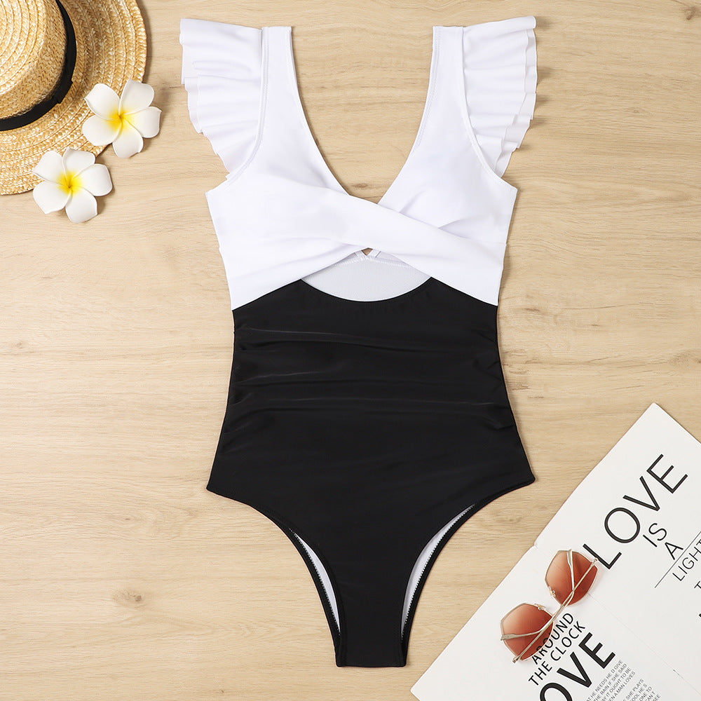 Women's swimwear with elegant ruffle design and chic twist detail Ivyshape