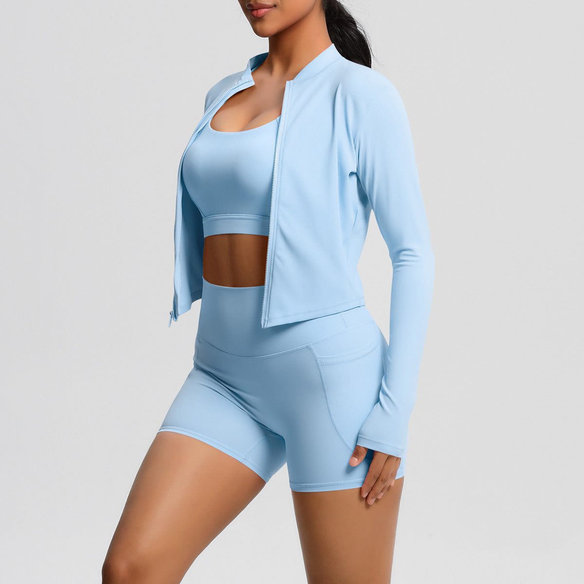 Women's sporty training set with fitted top and high-waisted shorts Ivyshape