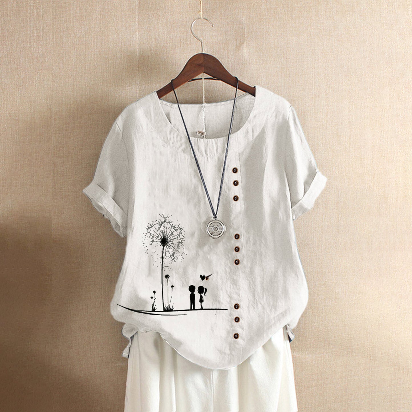 Women's linen shorts with floral appliqué and button details Ivyshape