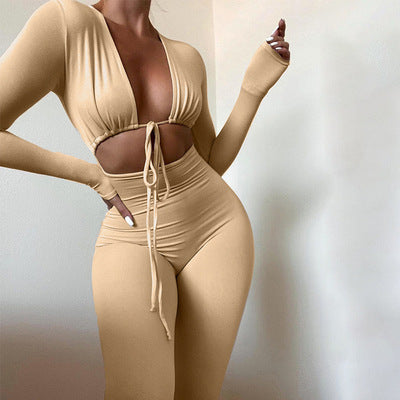 Women's fitted jumpsuit with deep V-neck and elegant long sleeves Ivyshape