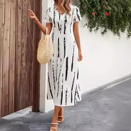 Women’s maxi dress with modern graphic design and practical side slits Ivyshape