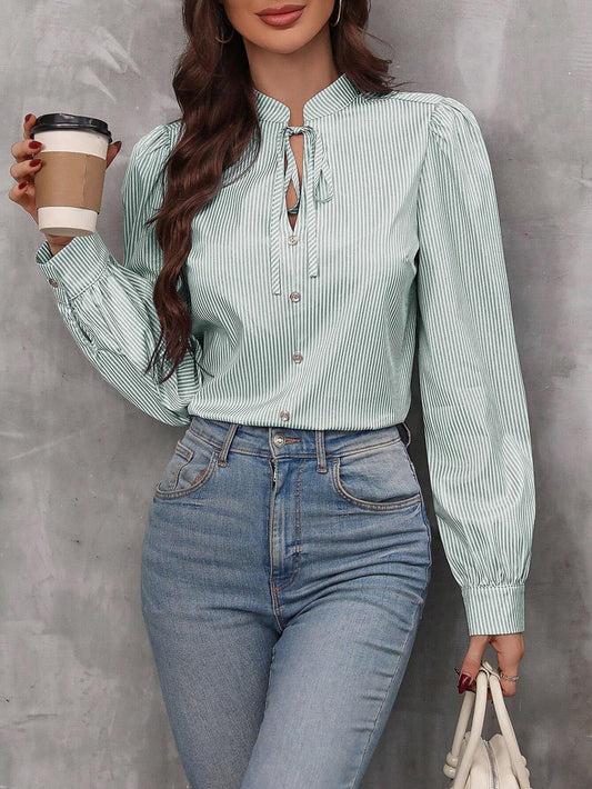 Women elegant striped blouse with puff sleeves and fine button details Ivyshape