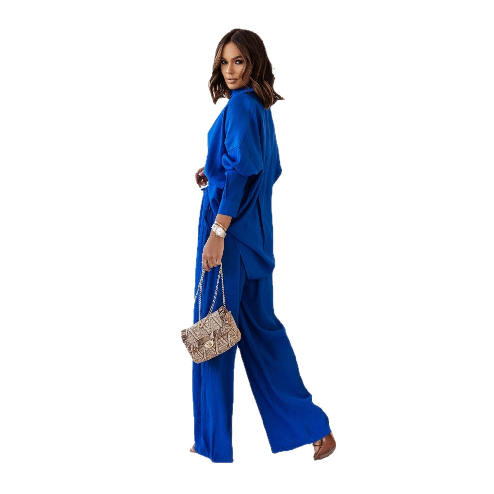 Women's loosely cut ensemble with asymmetric design and elegant belt Ivyshape