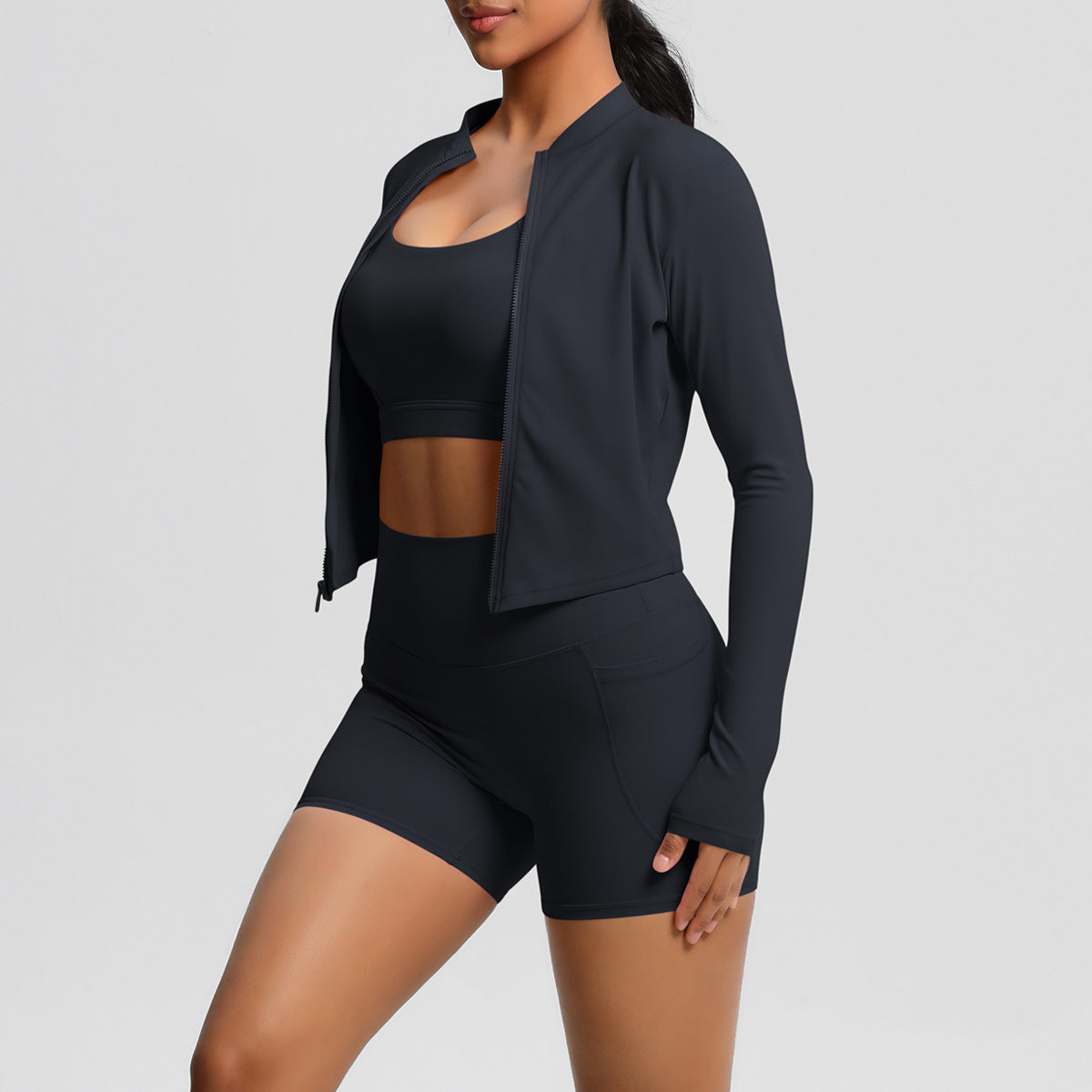 Women's sporty training set with fitted top and high-waisted shorts Ivyshape
