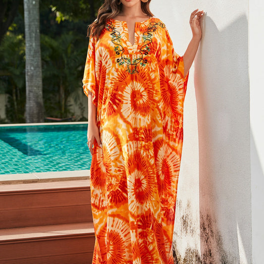 Women's beach kaftan with elaborate spiral pattern and airy silhouette Ivyshape