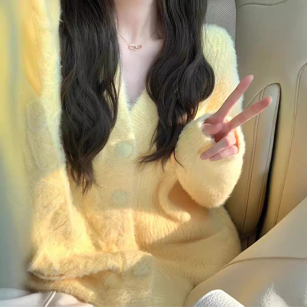 Women's oversized cardigan with soft fleece and special button details Ivyshape