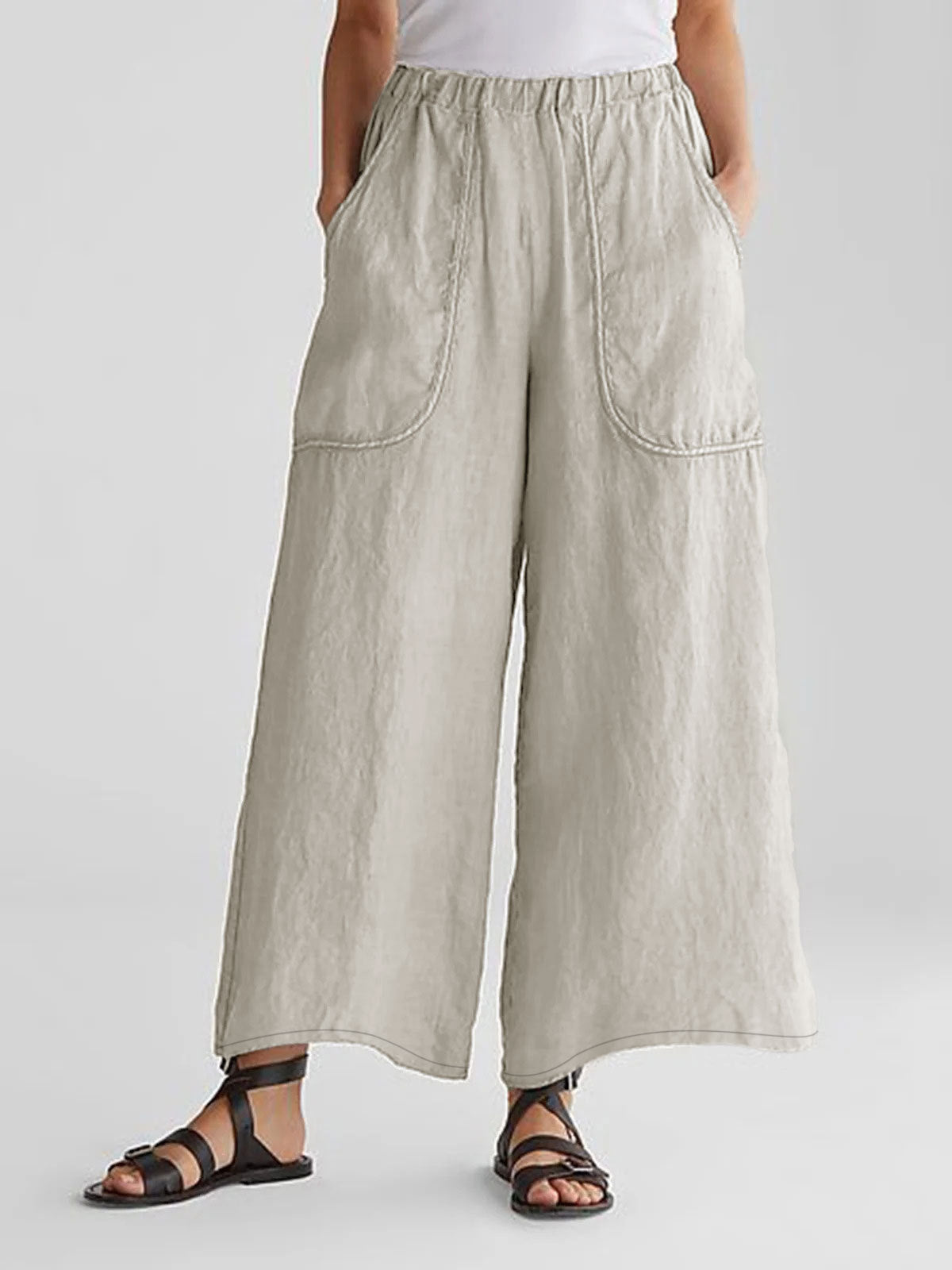 Women's lightweight, loose-fitting linen trousers with elastic waistband and practical pockets Ivyshape