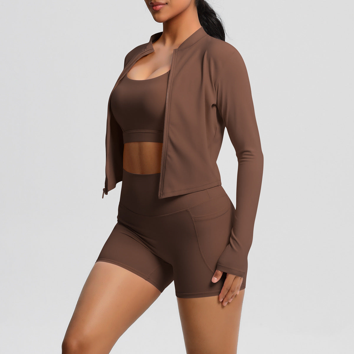 Women's sporty training set with fitted top and high-waisted shorts Ivyshape