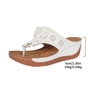 Women's wedge sandals with stylish floral details and ergonomic footbed Ivyshape