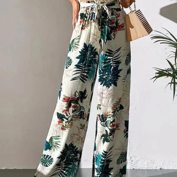 Wide women's trousers with floral print and elastic waistband Ivyshape