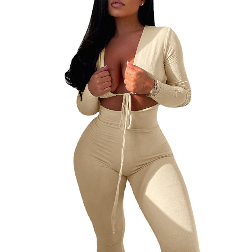 Women's fitted jumpsuit with deep V-neck and elegant long sleeves Ivyshape