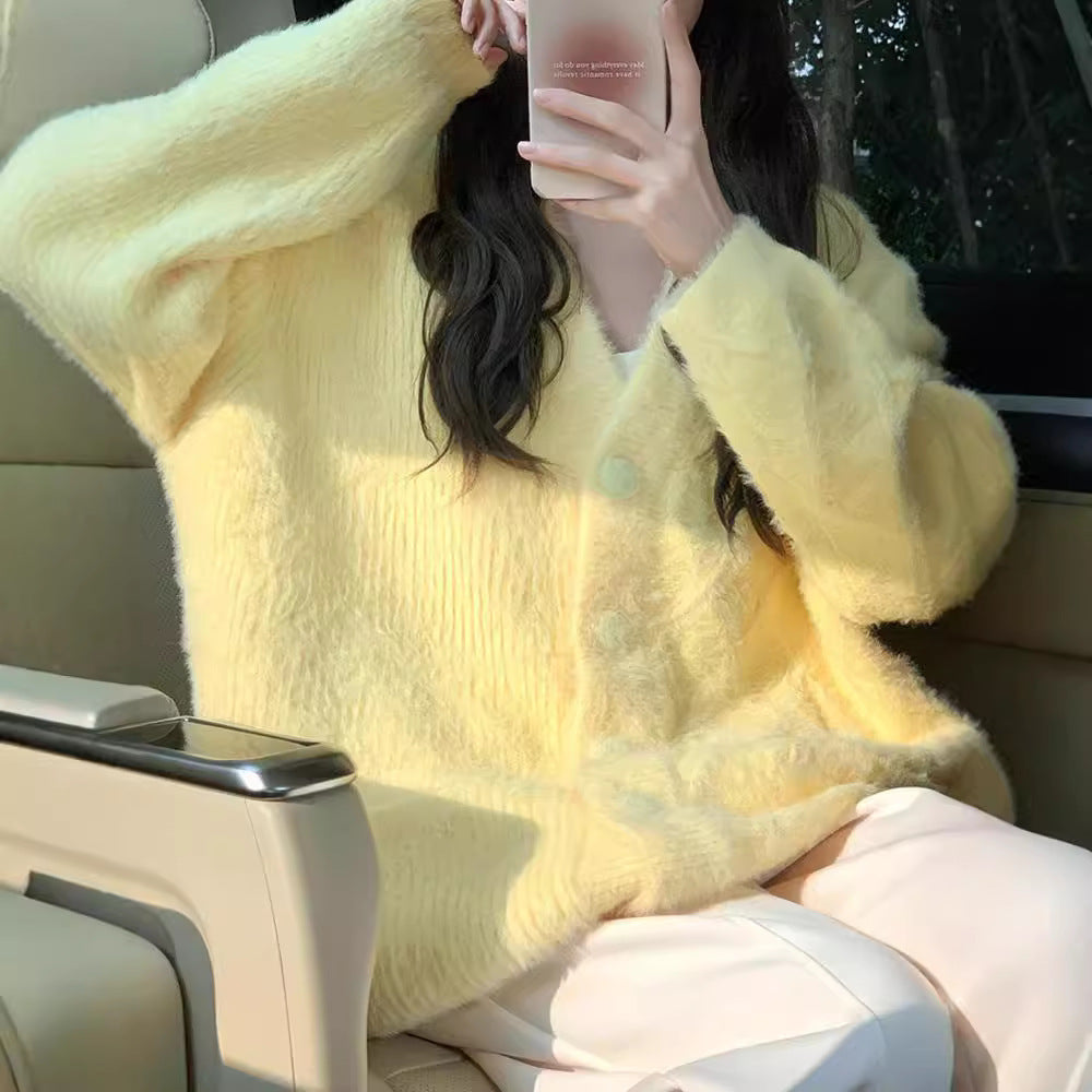 Women's oversized cardigan with soft fleece and special button details Ivyshape