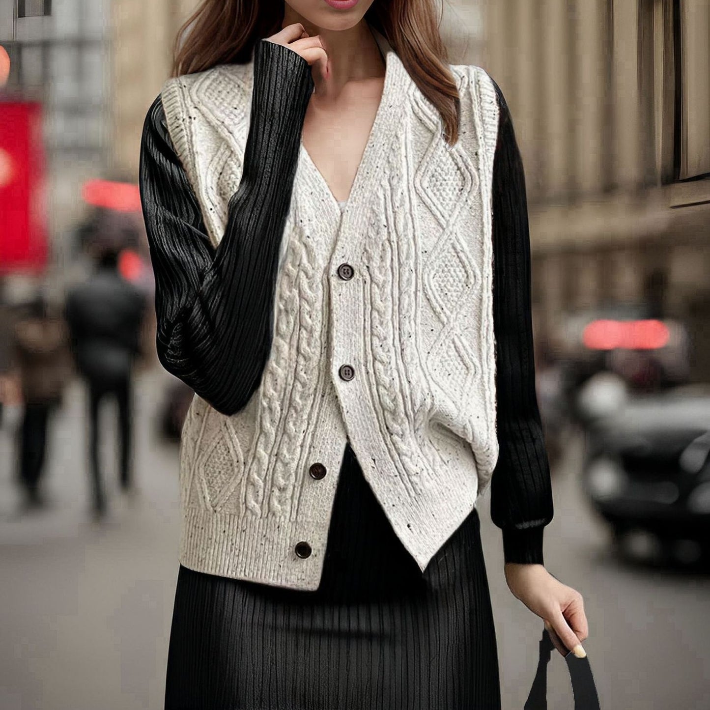 Women's knitted vest with intricate cable pattern and button details Ivyshape