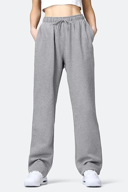 Women's comfortable sports pants with elastic waistband and practical pockets Ivyshape