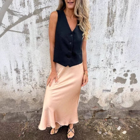 Ladies two-piece set consisting of sleeveless vest and shiny skirt Ivyshape