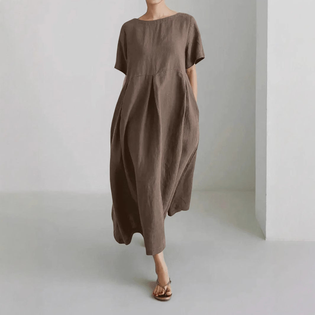 Women's maxi dress with a casual cut and practical pockets Ivyshape