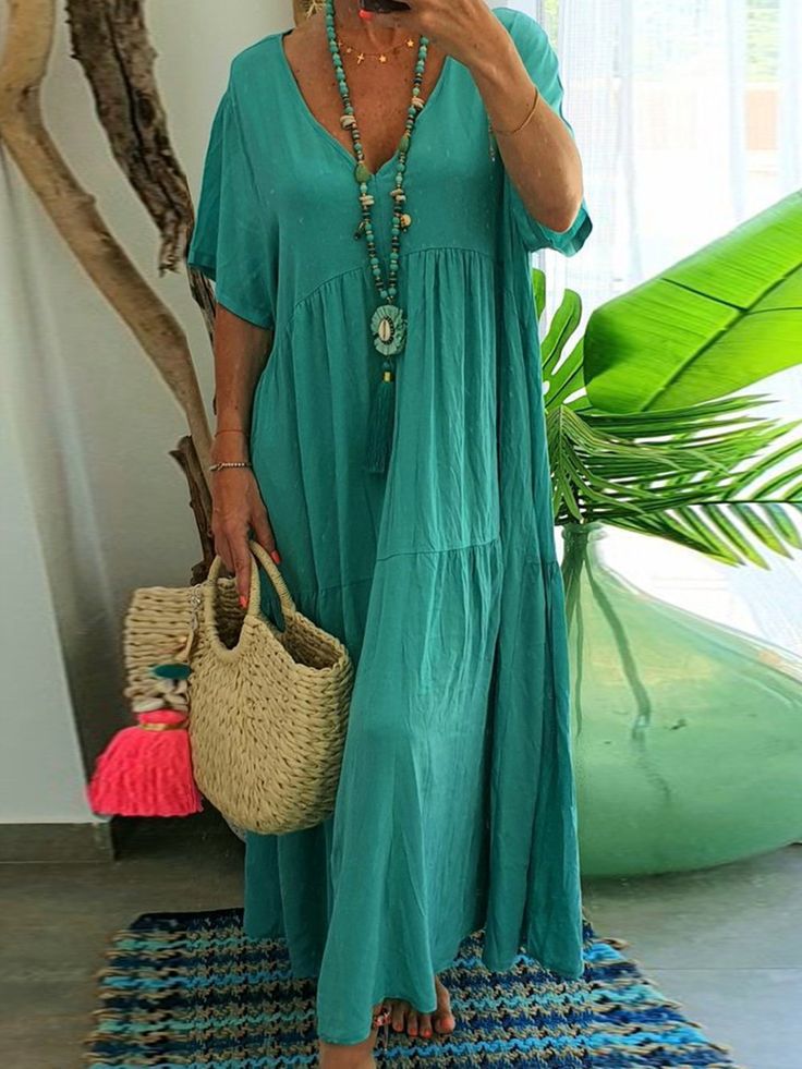 Women's airy boho maxi dress with flouncy hem and deep V-neck Ivyshape