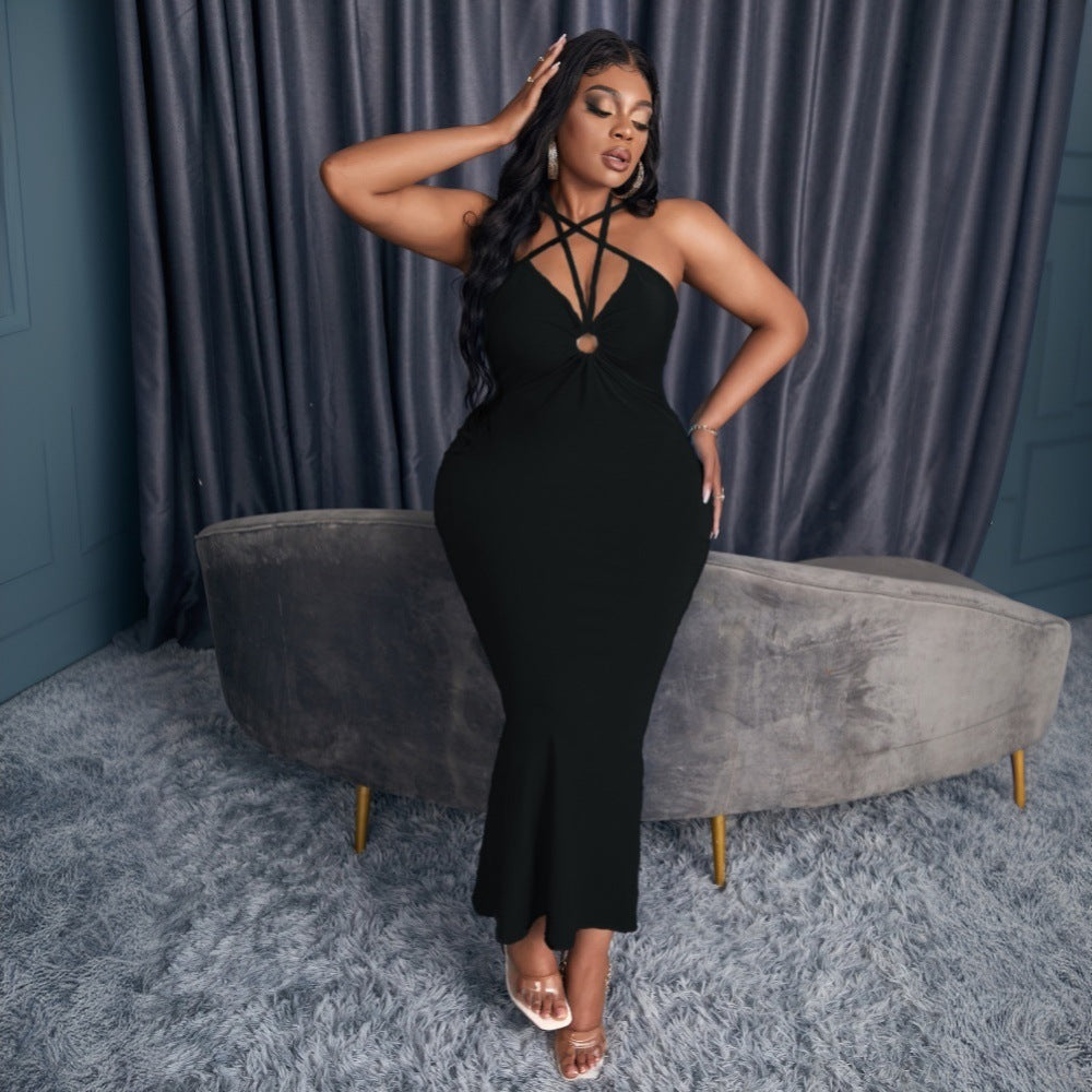 Women elegant wrap dress with deep V-neckline and sophisticated strap details Ivyshape