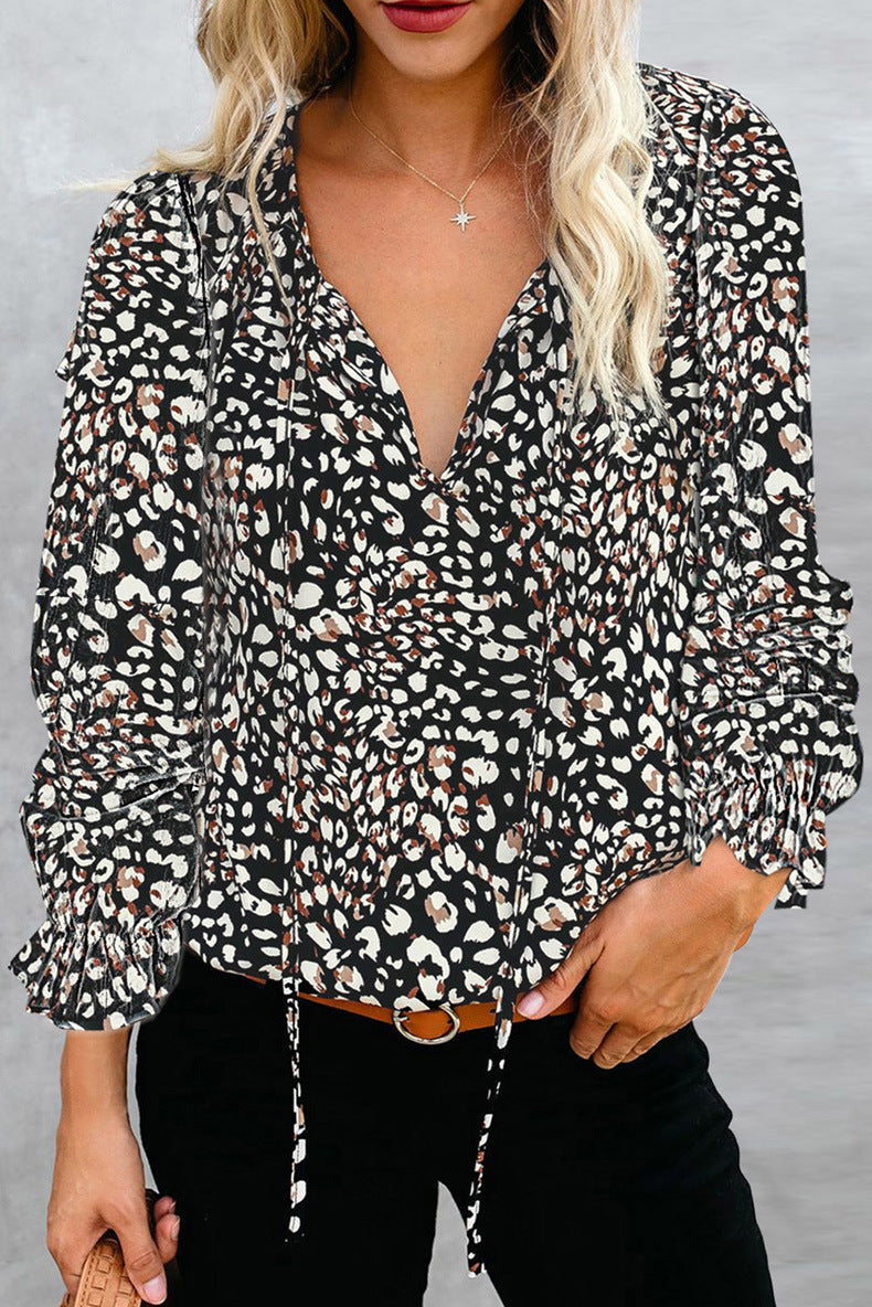 Women elegant tie blouse with ruffle details and deep V-neck Ivyshape