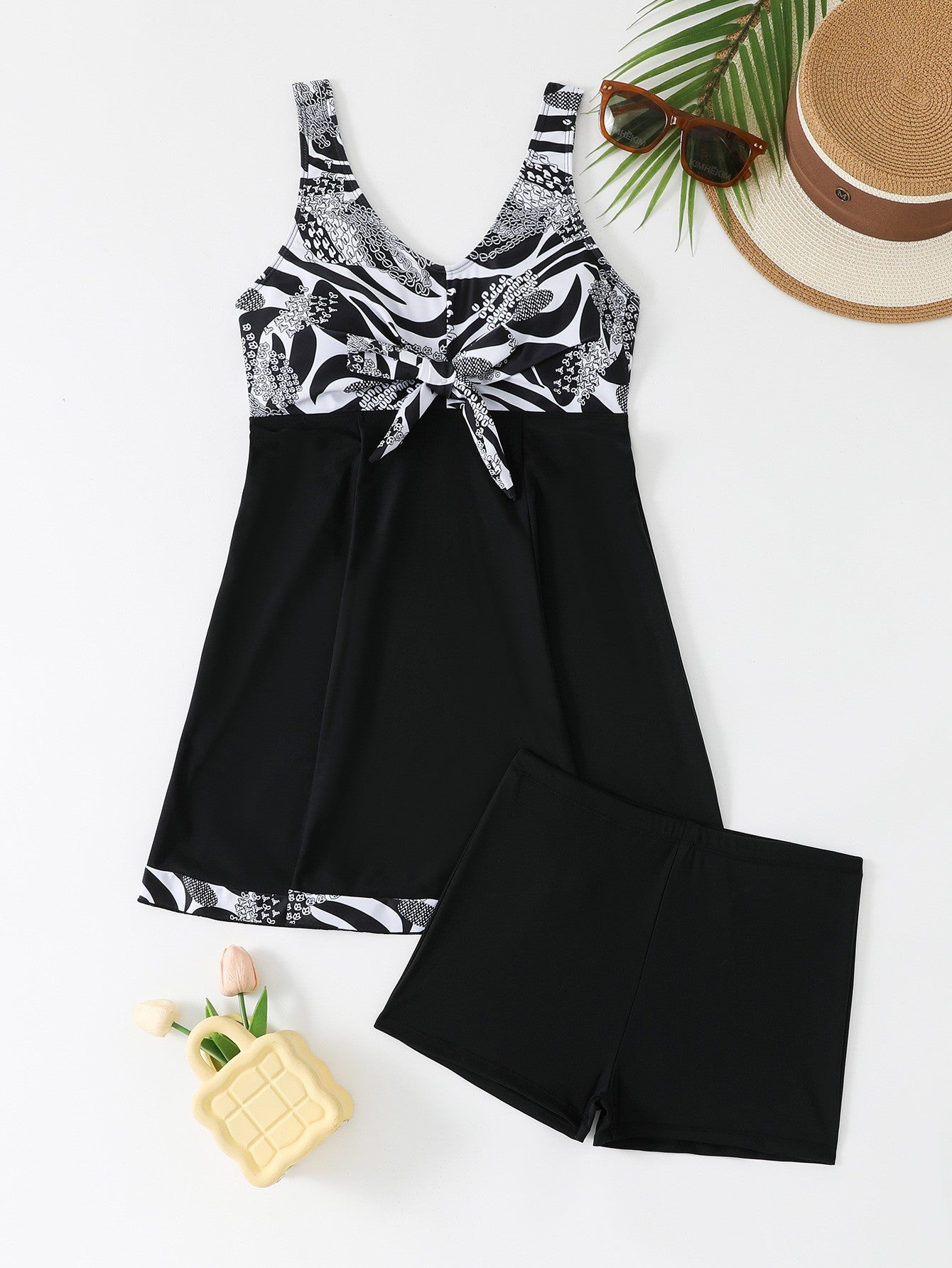 Women's stylish tankini with tasteful knot detail and sporty fit Ivyshape