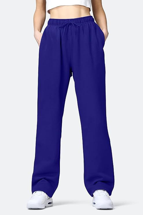 Women's comfortable sports pants with elastic waistband and practical pockets Ivyshape