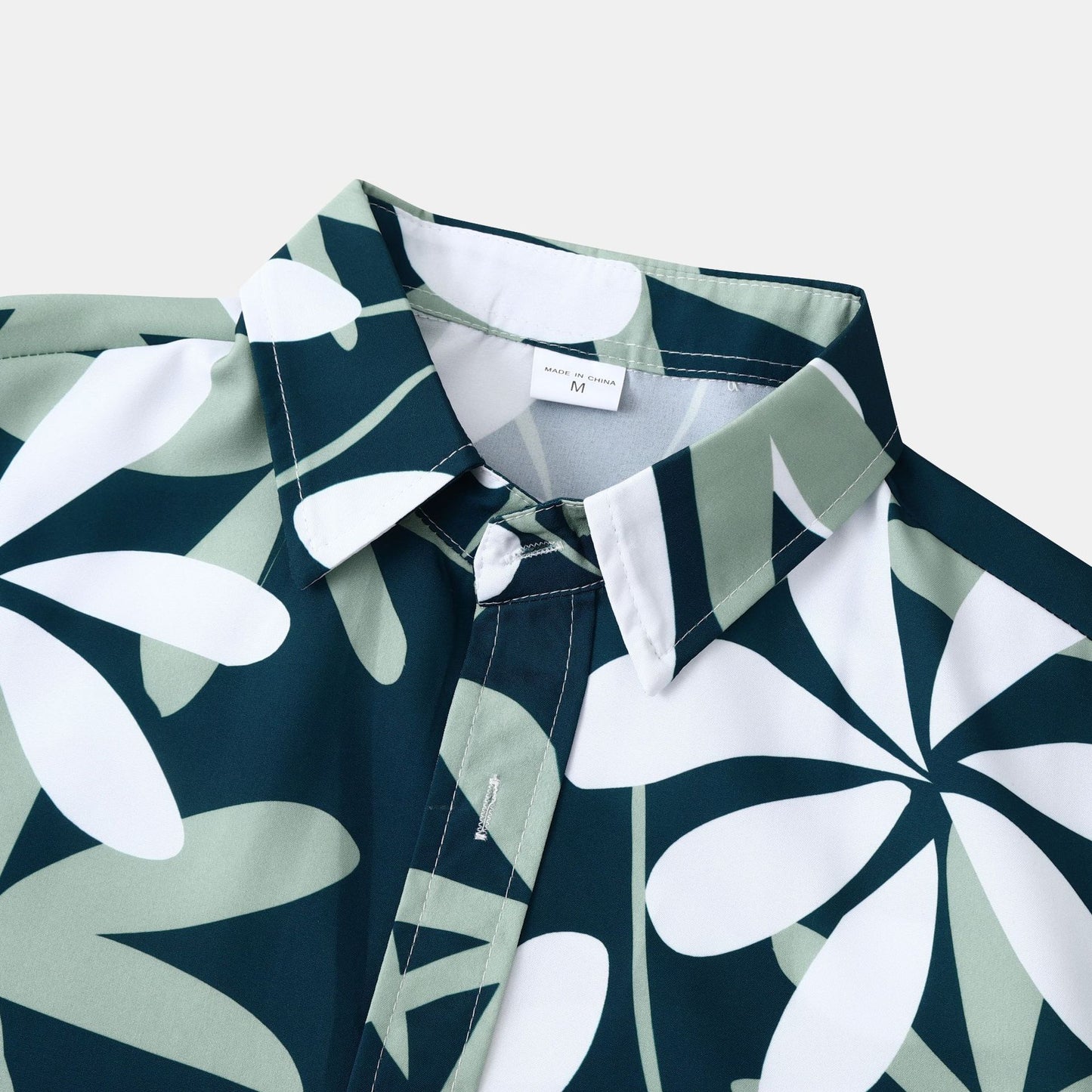 Women’s short-sleeve shirt with tropical plant motif and modern details Ivyshape
