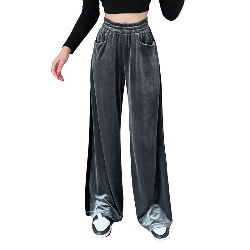 Women's wide palazzo pants made of velvety material with a high waistband and practical pockets Ivyshape