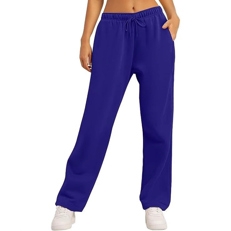 Women's comfortable sports pants with elastic waistband and practical pockets Ivyshape