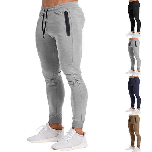 Men's sporty fitness pants with breathable inserts and practical zip pockets Ivyshape