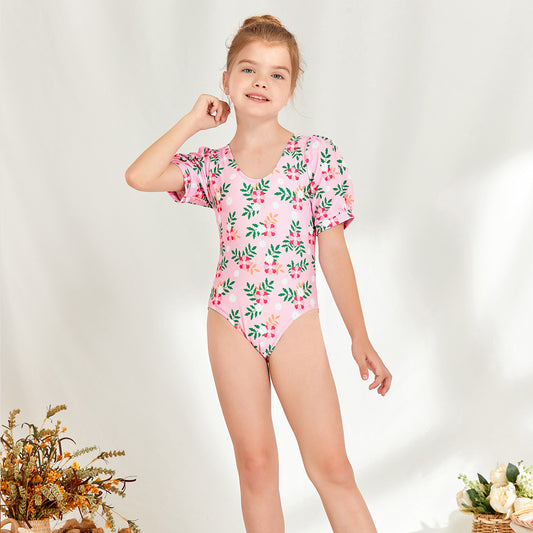 Girl's one-piece swimsuit with puff sleeves and floral design Ivyshape