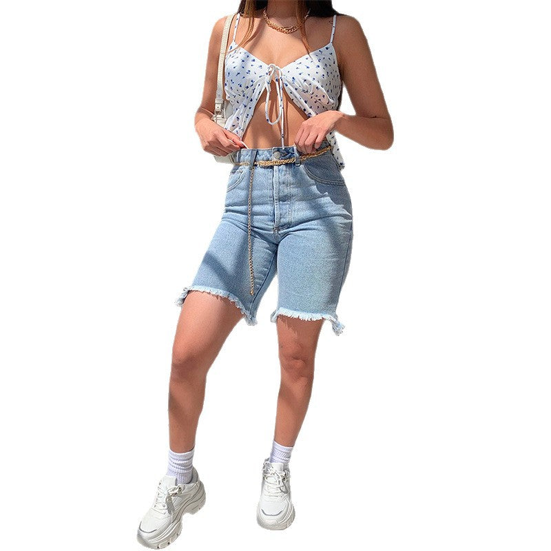 Women’s denim shorts in a modern high-waist cut with frayed edges Ivyshape