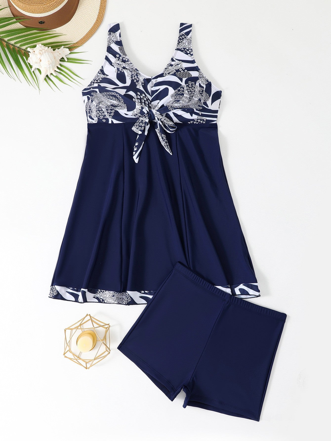 Women's stylish tankini with tasteful knot detail and sporty fit Ivyshape